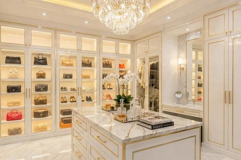 Modern luxury walk-in closet with tailored storage solutions